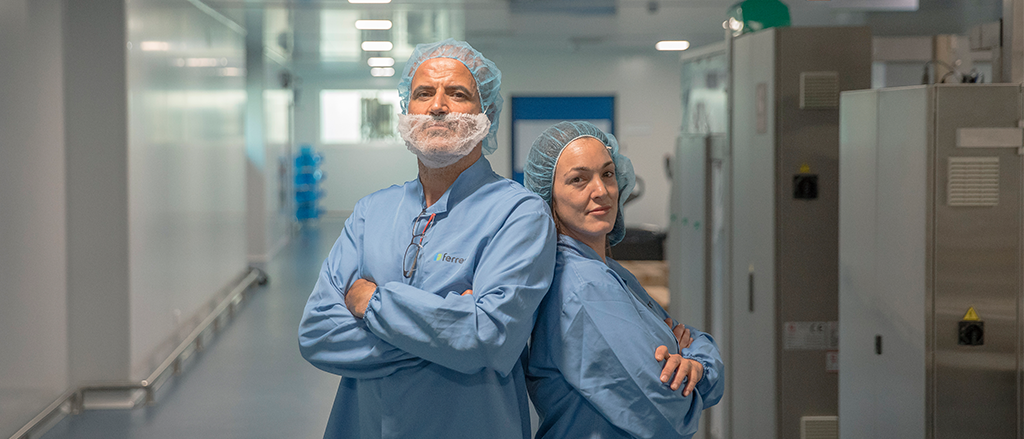 Ferrer Group professionals reflecting trust and excellence in the drug manufacturing plant.
