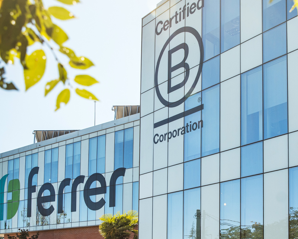 Ferrer main building facilities with the B Corp. logo