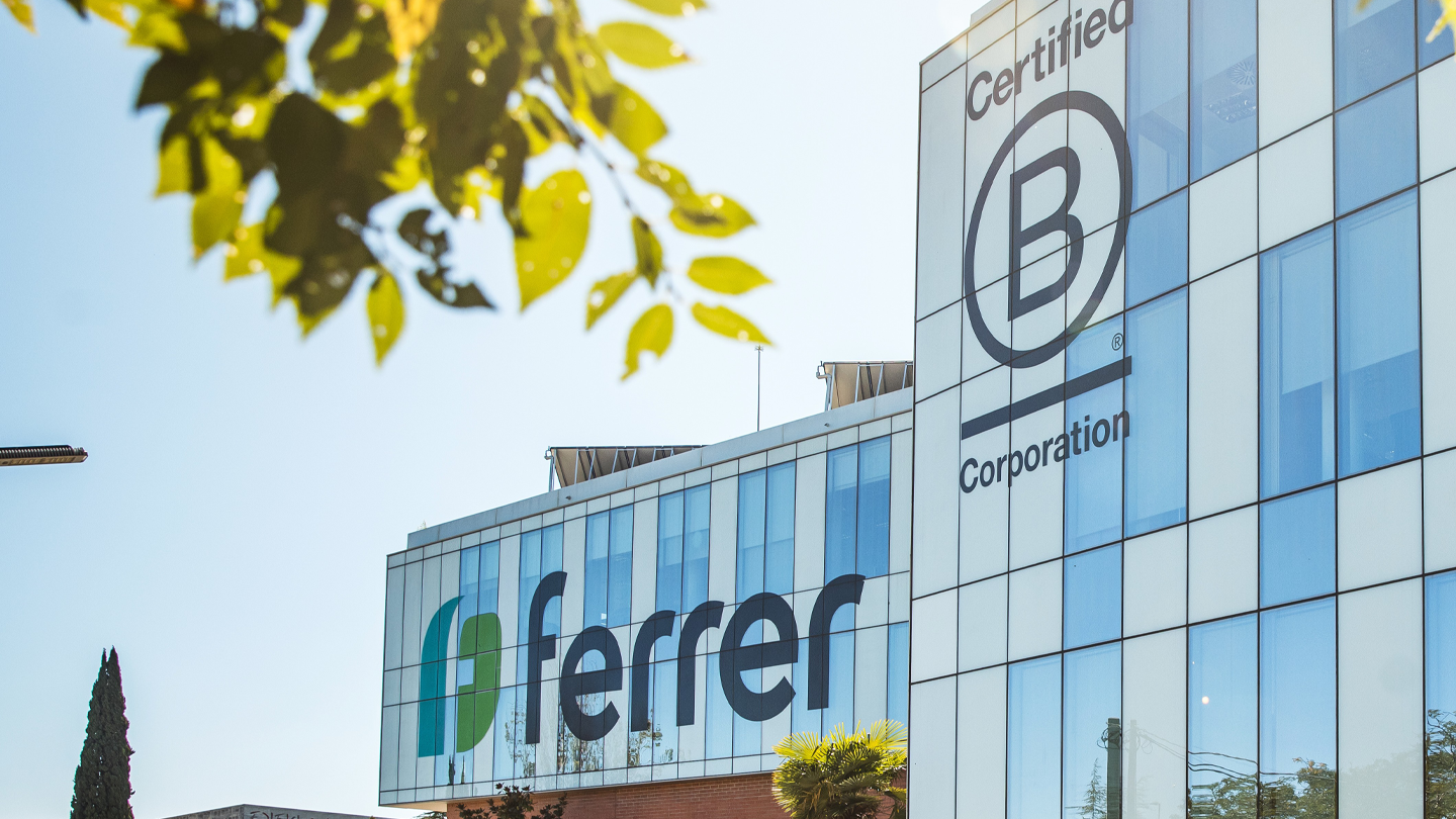 Ferrer main building facilities with the B Corp. logo