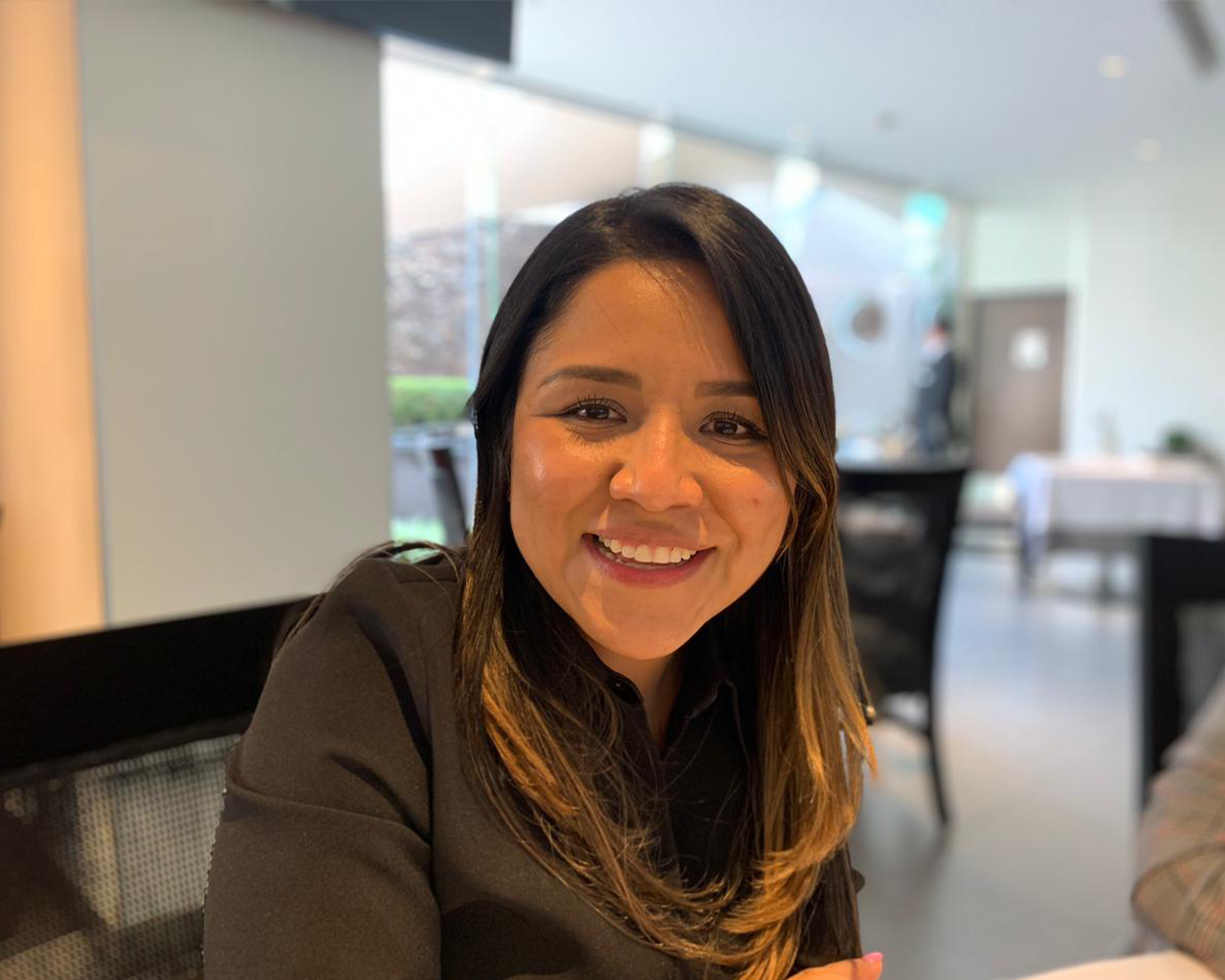 Ferrer worker smiling in the company's laboratories.