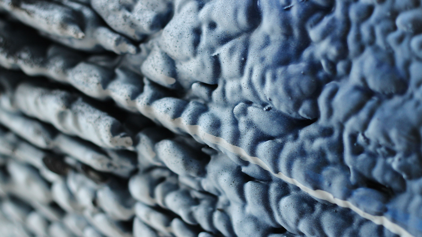 Abstract microscopic texture of neuronal structures, linked to drug development and research into Huntington's disease at Ferrer.