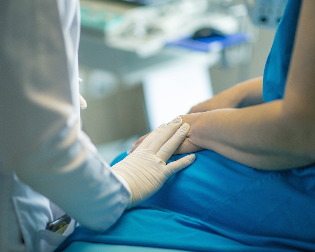 Healthcare professional offering support and a holistic approach to caring for Ferrer patients.